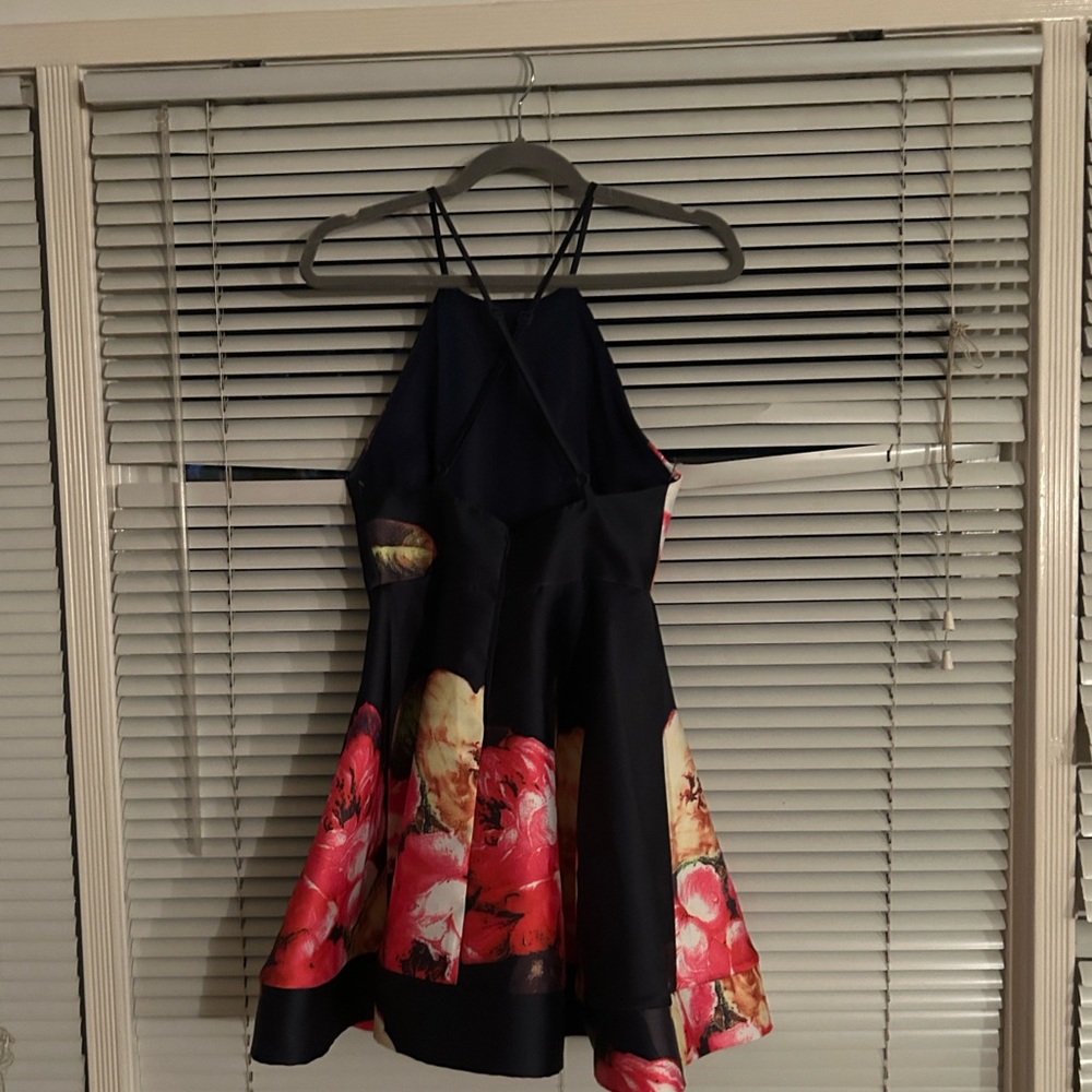 A’Gacie Floral Halter Dress. Fit and flare. Navy blue with flowers